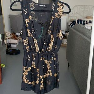 Black nude low cut romper